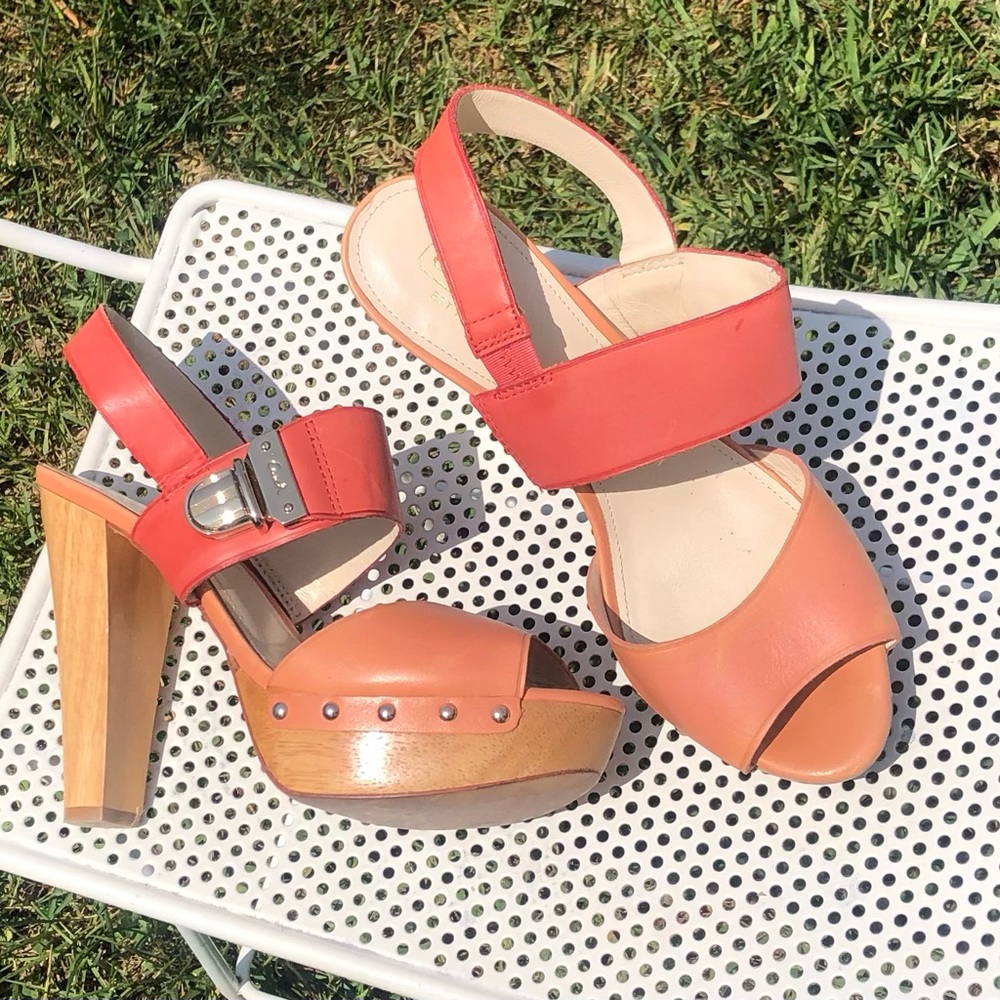 Coach High Heels.  7.5 B. Stunning duo-tone coral with gold studs and buckles.